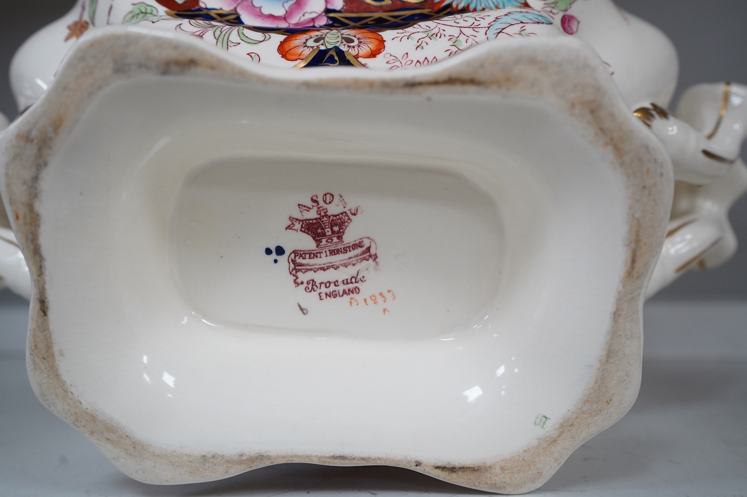 A Mason's ironstone tureen and cover, early 20th century, a Victorian Peking comport and a floral bowl and cover, largest 33cm (3). Condition - good